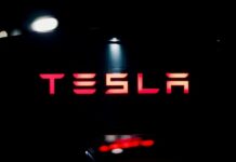 Tesla holds bitcoin steady, reports $112M impairment loss Tesla holds bitcoin steady, reports $112M impairment loss